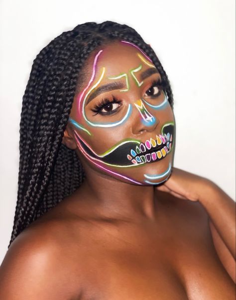 Colorful light up neon skeletal makeup Colourful Skull Makeup, Girls Skeleton Makeup, Girl Skeleton Makeup, Neon Skeleton Makeup, Neon Skull Makeup, Neon Skeleton, Neon Skull, Simple Skull, Skeleton Face