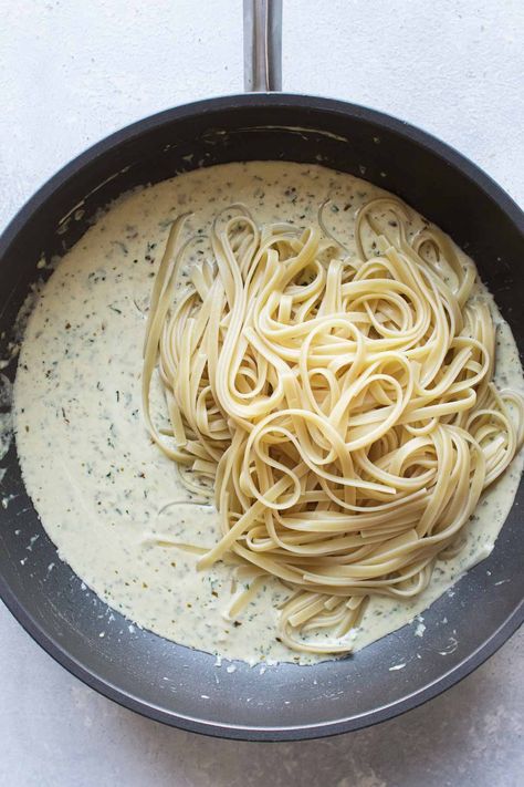 For a super easy creamy fettuccine pasta dish, add pesto to a cream sauce. You only need a handful of simple ingredients for this creamy pesto sauce, and it's ready in about 20 minutes. It's perfect for a quick dinner when you're craving pasta. Dinner Ideas With Pesto Sauce, Pesto Cream Pasta, Homemade Creamy Pesto Sauce, Pesto Sauce Recipe For Pasta, Homemade Sauce For Pasta, Creamy Pesto Sauce Recipe, Pasta Monday, Pasta Cream Sauce, Quick Pasta Dinner