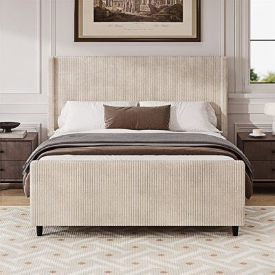 Elegant Platform Bed: The bed frame is crafted from premium corduroy, boasting a unique texture that enhance the bedroom with a touch of modern beauty. Latitude Run® Colour: Cream, Size: King | Latitude Run® 50.7" High Headboard Corduroy Upholstered Bed Frame w/ Vertical Stripe Wingback And High Footboard No Box Spring Needed | C112112002_2124146924_2124146926 | Wayfair Canada Cream Upholstered Bed, Taupe Bedroom, High Headboards, High Headboard, Modern Headboard, Hudson Homes, Upholstered Bed Frame, Size King, Upholstered Bed