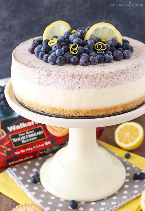 Lemon Blueberry Mousse Cake - This cake is almost entirely no bake and perfect for spring and summer! A layer of blueberry and lemon mousse on top of white chocolate ganache and a Walkers Shortbread crust! Blueberry Mousse Cake, Blueberry Shortbread, Lemon Mousse Cake, Blueberry Mousse, Shortbread Cake, Raspberry Frosting, Walkers Shortbread, Lemon Shortbread, Mousse Cake Recipe