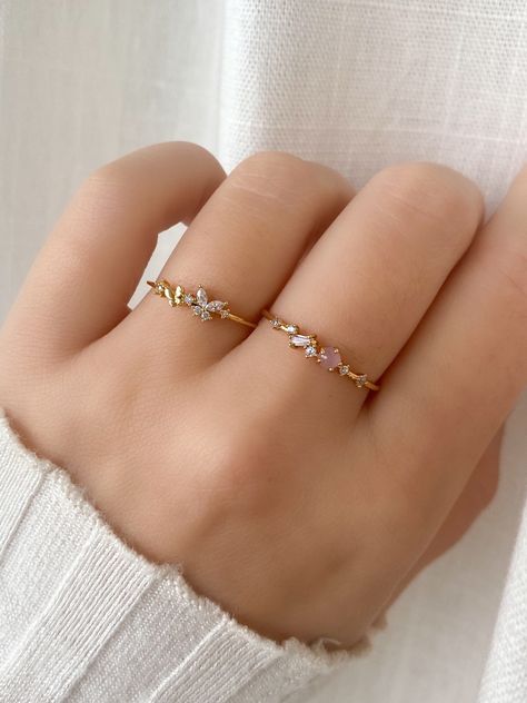 This eclectic ring has an array of crystals in different colours and shapes to form a unique, distinct design. Main material: Rose Gold, Rhodium, 16k Gold Plated on Brass, Cubic Zirconia * Tarnish-resistant protective coating Need some jewelry inspiration? Follow us on Instagram  @statementGrey