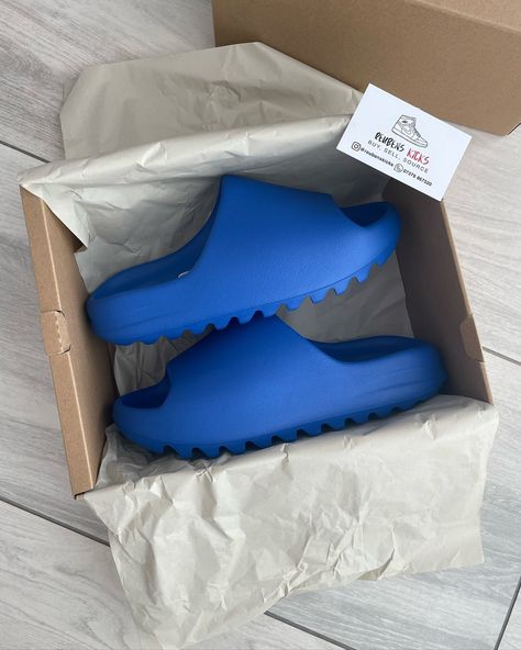 The Yeezy Slide in “Azure” Now Instock in All Sizes 👀 - Guaranteed 100% Authentic - Ships Within 3 Days Get Yours Now Via Link in Bio 🔥 www.reubenskicks.com 🌐 Yeezy Slides, Get Yours Now, Slide In, Link In Bio, Slides, Dark Blue, The 100, Room Decor, Ships