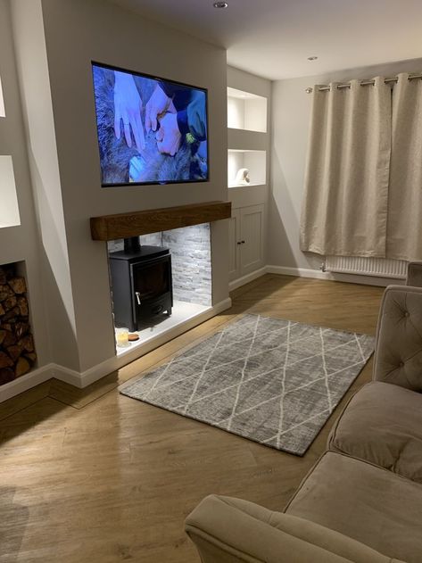 home-decor-ideas-wall-decor-TV-Stands-TV lounge decoration ideas Tv Wood Burner Wall, Oak Beam Fireplace With Tv, Oak Beams Living Room, Tv And Stove Wall Ideas, Tv Wall With Log Burner, Living Room With Log Burner And Tv, Log Burner Wall Ideas, Woodburner Tv Wall, Woodburner With Tv Above