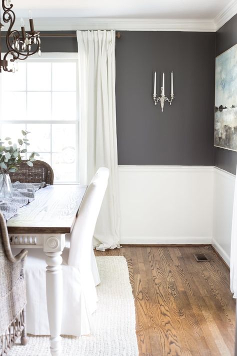 Benjamin Moore Kendall Charcoal dining room with French sconce Charcoal Grey Dining Room, Charcoal Linen Benjamin Moore, Benjamin Moore Dining Room Colors, Kendall Charcoal Dining Room, Gray Wall Dining Room, Two Toned Dining Room Walls, Grey Dining Rooms, Charcoal Dining Room, Dining Room Candle