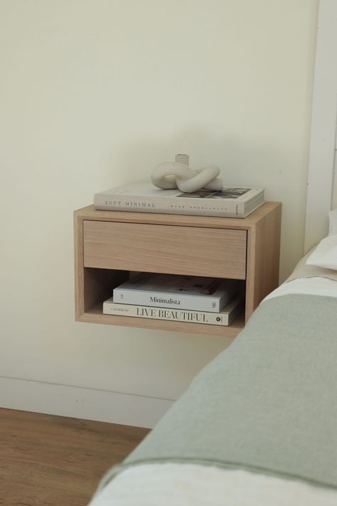 "A minimalistic modern, yet warm and elegant nightstand to elevate the first and last moments of your day. Our floating nightstands are designed to keep your bedside organized and your bedroom simple and calm with a clean, soft natural touch. Our nightstands are individually handcrafted from locally sourced, premium quality, kiln-dried 3/4\" solid white oak or walnut (see separate listing) featuring a continuous waterfall design highlighting the beauty of the grains. Each nightstand is finished to the finest touch and treated with a 0% VOC, plant-based hardwax oil providing a beautiful, yet highly durable surface. The drawer features Blum premium quality soft-close hardware. The box is built from birch plywood for maximizing space and strength, and the front is made from solid wood. The in Nightstand Floating, White Oak Nightstand, Modern Floating Nightstand, Elegant Nightstand, Floating Nightstands, Nightstand Design, Floating Bedside Table, Nightstand White, Oak Bedroom Furniture