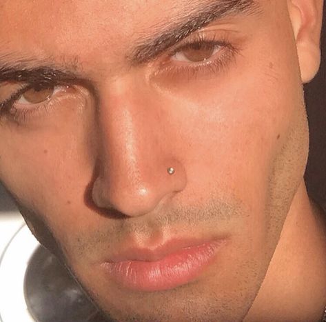 Nose Ring Men Aesthetic, Mens Nose Piercing Hoop, Men Nose Piercing Studs Guys, Piercings Men Nose, Man With Nose Piercing, Men’s Nose Piercing Stud, Men’s Piercings Nose, Men Peircings Face, Guys Nose Piercing