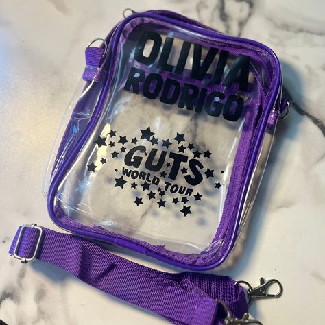 Olivia Rodrigo Guts Tour Stadium Approved Bag, Guts Tour 2023 Clear Bag Purple Lining Black Words Stadium Approved Bag Guts Tour Sunglasses, Oliva Rodrigo Merch, Olivia Rodrigo Stuff To Buy, Olivia Rodrigo Merch Collection, Olivia Rodrigo Gifts, Olivia Rodrigo Room Decor, Olivia Rodrigo Stuff, Olivia Rodrigo Merch, Bag Tour