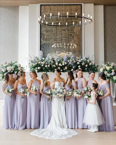 Purple rain for the beautiful couple 💜 Featuring Chiffon bridesmaid dresses in Lavender #BIRDYGREY #birdyinthewild Photographer: @kirstenannphotography Wedding Bridesmaid Dresses Lavender, Wedding Bridesmaid Dresses Light Purple, Spring Wedding Colors Lavender, Iris Bridesmaid Dresses, Purple Bridemaid Dress, Purple Pastel Bridesmaid Dresses, Wisteria Purple Bridesmaid Dresses, Purple Grey Bridesmaid Dresses, Light Purple Silk Bridesmaid Dresses