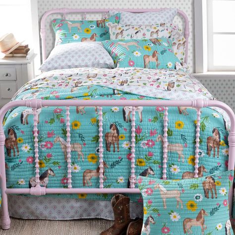 PRICES MAY VARY. Quilt has an all-over pattern of pretty ponies and colorful daisies against a vibrant turquoise background. Reverses to a small pink and turquoise diamond pattern against a white background. 100% Cotton. Machine washable. Imported. Twin quilt measures 66" W x 86" L. Full/queen quilt measures 86" W x 86" L. With a parade of pretty ponies and cheery flowers, our Rod's Exclusive Horse Girls Daisy Pony quilt will transform your little cowgirl's room into a horse girl's dream come tr Cowgirl Bedroom Decor, Girl Horse Room, Cowgirl Bedroom, Cowgirl Room, Paisley Bedding, Horse Room, Horse Bedding, Western Bedding, Kids Bedding Sets