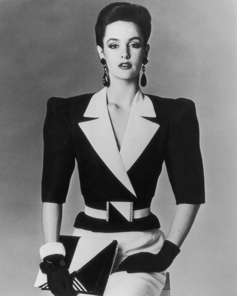 The decade's most prominent silhouette was the one that turned your body into an upside-down triangle. Add a couple giant earrings and a big belt, ... Istoria Modei, 1980s Fashion Trends, Look 80s, Jean Louis Scherrer, Fashion 1980s, 80s Fashion Trends, 80’s Fashion, New Retro Wave, Fashion 80s