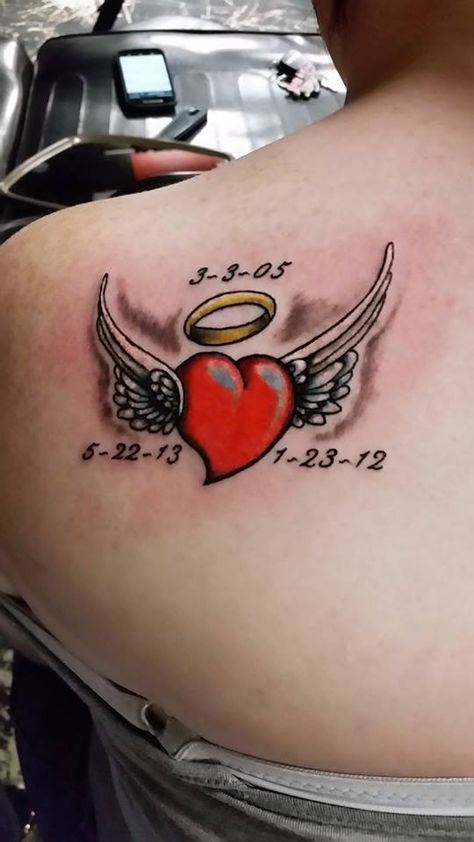 #memorial #family #heart #angel #wings #color #tattoo #studio13tattoomg Heart Wings Tattoo Design, Angle Wings Tattoo Women, Heart With Stitches Tattoo, Heart Shaped Angel Wing Tattoo, Angle Wing Tattoos, Memorial Tattoo Quotes, Wings Color, Halo Tattoo, Heart With Wings Tattoo