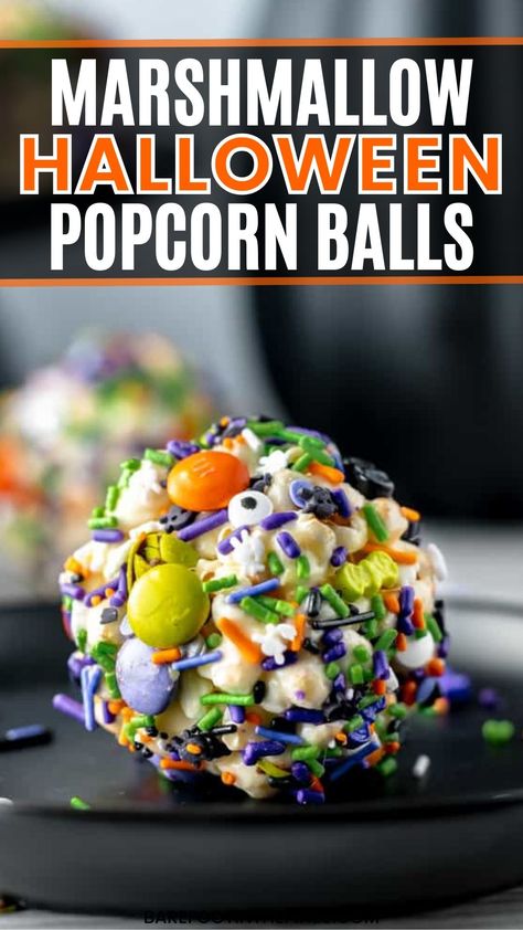 Looking for fun marshmallow Halloween popcorn ball ideas? This easy no-bake Halloween recipe is made with popcorn, mini marshmallows, and ghostly candies. It's the perfect Halloween kids treat to create and decorate." Marshmallow Halloween Treats, Mini Marshmallows Recipes, Halloween Popcorn Balls Recipe, Popcorn Balls Recipe Easy, Marshmallow Popcorn Balls, Halloween Popcorn Balls, Marshmallow Halloween, Popcorn Ball, Popcorn Recipes Easy