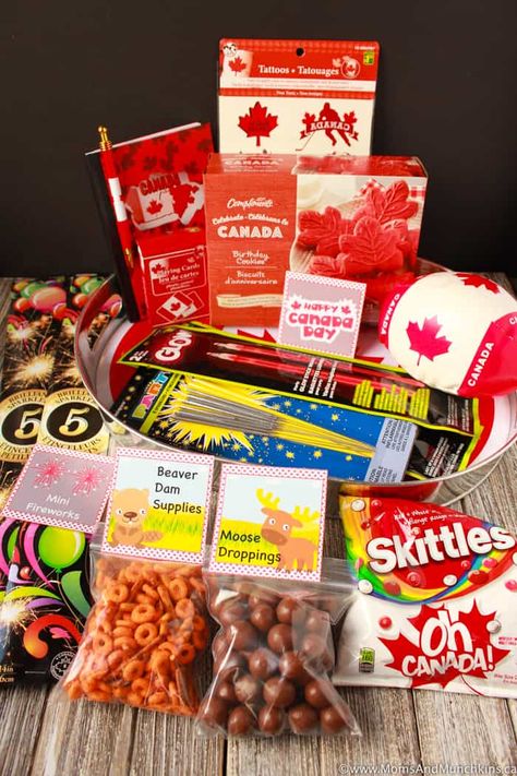 Canada Day Party - Host Gift Ideas - Moms & Munchkins Host Gift Ideas, Hostess Basket, Party Host Gift, Canada Party, Canada Birthday, Small Stuffed Toys, Canada Day Party, Red Basket, Red Tissue Paper