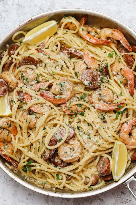 Our creamy Cajun shrimp pasta is an easy, flavorful weeknight meal. Made with homemade blackening blend and andouille sausage, it's packed with flavor! #wellseasonedstudio #cajunpasta #cajunshrimp #shrimppasta #blackenedshrimp Pasta With Andouille Sausage, Sausage And Shrimp Recipes, Shrimp And Sausage Pasta, Creamy Cajun Shrimp, Creamy Cajun Shrimp Pasta, Healthy Pasta Dishes, Lemon Garlic Pasta, Cajun Shrimp Pasta, Shrimp Sausage