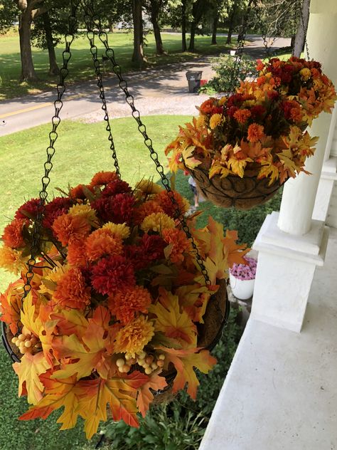 Fall Outdoor Hanging Basket Ideas, Hanging Holiday Baskets, Front Porch Hanging Baskets Winter, Fall Hanging Baskets Diy, Artificial Fall Hanging Baskets, Fall Outdoor Hanging Baskets, Hanging Fall Plants, Fall Hanging Basket Ideas Front Porch, Fall Hanging Planter Ideas