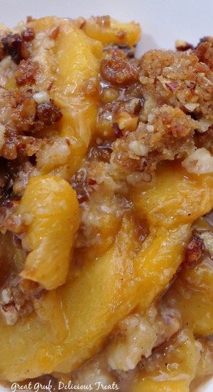 Peach Cobbler Recipe is made with fresh, juicy peaches, a classic cobbler topping then topped with a brown sugar pecan crust topping. Peach Cobbler With Lattice Crust, Fruit Cobbler Recipes Crumble Topping, Grandmas Famous Peach Cobbler, Kardea Brown Peach Cobbler, Peach Cobbler With Pecans, Creeping Crust Peach Cobbler, Peach Pecan Cobbler, Peach Cobbler With Streusel Topping, Krispy Kreme Peach Cobbler