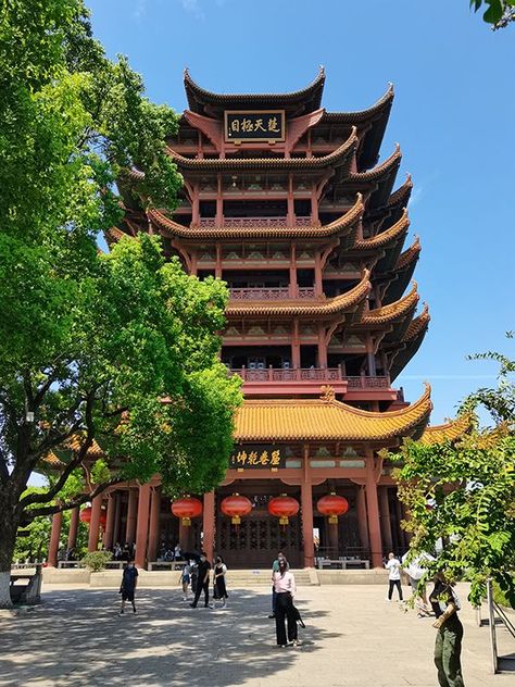 Check out the landmark of Wuhan, Central China’s Hubei province! Established in AD 223, the Yellow Crane Tower was honored in poems praising it during the Tang Dynasty (618-907) and is one of the four most famous towers in China. Yellow Crane Tower, Tang Dynasty, China Travel, Travel And Tourism, The Four, Tourism, Tower, China, House Styles