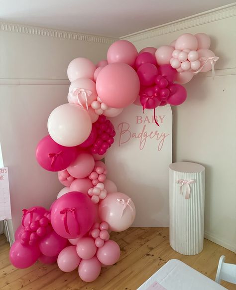 Baby Badgery 🩷🎀 1st Birthday Arch Backdrop, Coquette Balloon Arch, Pink Arch Backdrop, Coquette Birthday Party Decorations, Pink Balloon Backdrop, Pink Party Theme Ideas, Birthday Balloon Backdrop, Birthday Arch Backdrop, Ballon Ideas