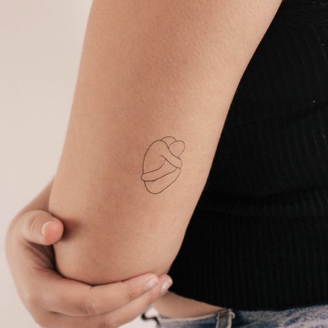 . Give the gift of love with these unique anatomical hug temporary tattoos. Perfect for Valentine's Day, anniversaries, or any special occasion. anatomicaltattoo hugtattoo . #Small_Tattoo_For_Boyfriend #Anatomy_Of_A_Hug_Tattoo #Heart_Hug_Tattoo #Aunt_Tattoo_For_Niece_And_Nephew Body Neutrality Tattoo, Anatomy Of A Hug Tattoo, Set Of 3 Tattoos, Hug Tattoo Ideas, Heart Hug Tattoo, Hugging Heart Tattoo, Hug Tattoo Minimalist, Tattoo Father And Daughter, Self Hug Tattoo