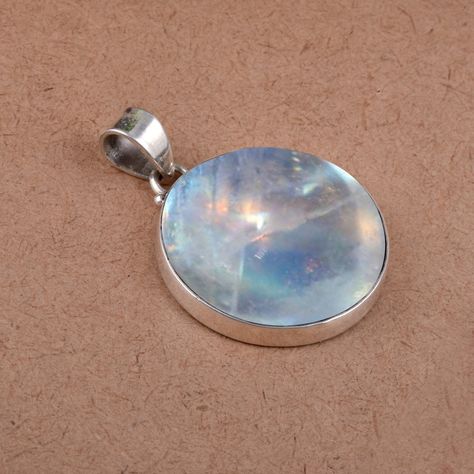 Excited to share the latest addition to my #etsy shop: NATURAL Rainbow Moonstone Pendant- Round shape- Rainbow moonstone HANDMADE Jewelry- Gift for her- Gemstone Pendant- Free Shipping https://etsy.me/3fDY9yz #moonstone #artdeco #no #silver #yes #boys #rainbow #lovefri Moon Stone Pendant, Vintage Designer Jewelry, Rainbow Moonstone Pendant, Moonstone Stone, Handmade Jewelry Gift, Moonstone Pendant, Unisex Jewelry, Unique Pendant, Handmade Pendants