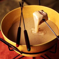 Classic Swiss Fondue Recipe | SAVEUR Swiss Fondue Recipe, Cheddar Fondue, Saveur Recipes, Swiss Fondue, Fondue Recipe, Abbotsford Bc, Fondue Party, Country Bread, Fondue Recipes