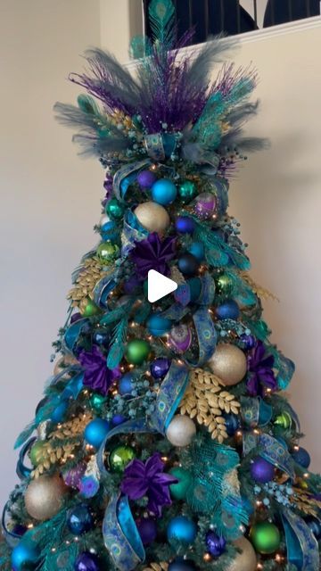 Antoinette Boston on Instagram: "Never forget my first peacock tree! 😍 It was also the first of 95 trees I decorated in 2022 and set the tone for the rest of the season! 
.
.
.
.
#christmasdecor #christmastree #noel #xmas #xmastree #navidad #christmas #christmasiscoming #natal #holidaydecor #christmasinspo #peacocktree #peacock" Peacock Christmas Decorations, Peacock Christmas Tree, Peacock Christmas, Holiday Trees, Christmas Inspo, Navidad Christmas, Christmas Is Coming, Holiday Tree, Xmas Tree