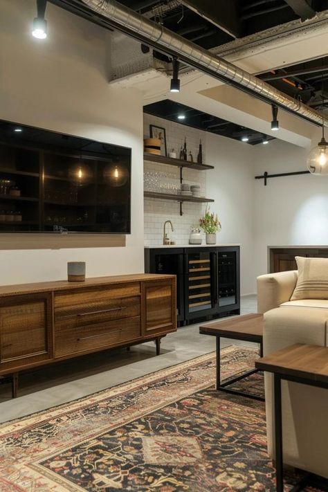 Creative Small Basement Ideas for Low Ceilings Basement Entertainment Room Ideas Layout, Basement Arrangement Ideas, Industrial Design Basement, Large Basement Living Room Ideas, Modern Vintage Basement, Loft Style Basement, Basement Exposed Ceiling Lighting, Basement Low Ceiling Remodel, Basement With Exposed Ceiling