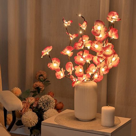 PRICES MAY VARY. The Fantasee Twig lights are made of high quality copper wire and has flexible branches with phalaenopsis that are accented with 20 warm white lights each set. Specification - Each pack of decorative twig lights comes with 5 bendable stems, 30 inches total length, and 20 led warm white light bulbs with 20 phalaenopsis. Safe and Easy Use - Battery Operated for safe and easy use, 2pcs AA battery (NOT included) required, 3V input voltage, completely safe for operation. DIY your Twi Orchid Lamp, Lamp Decoration Ideas, Fairy Light Decor, Light Decoration Ideas, Bead Lamp, Branch Lamp, Diy Orchids, Mandala Home Decor, Twig Lights