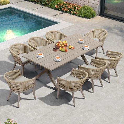 PRICES MAY VARY. The all-weather dining table set includes: 1 X dining table (80.71"L x 38.58"W x 29.13"H), 8 X dining chairs (19.69"L x 18.5"W x 29.33"H), and 8 X cushions. Premium Material: All Aluminum frames with powder coating impart exceptional structural robustness, ensuring long-term integrity and rust resistance. Ergonomic Design: The backrest angle of dining chairs is optimized for superior ergonomic support and comfort. Soft Cushion: High-density fabric and sponge create a soft, durab Small Outdoor Patios, Outdoor Patio Table, Front Porch Design, Porch Makeover, Patio Dining Table, Front Porch Decorating, Porch Design, Dining Table Set, Outdoor Dining Furniture