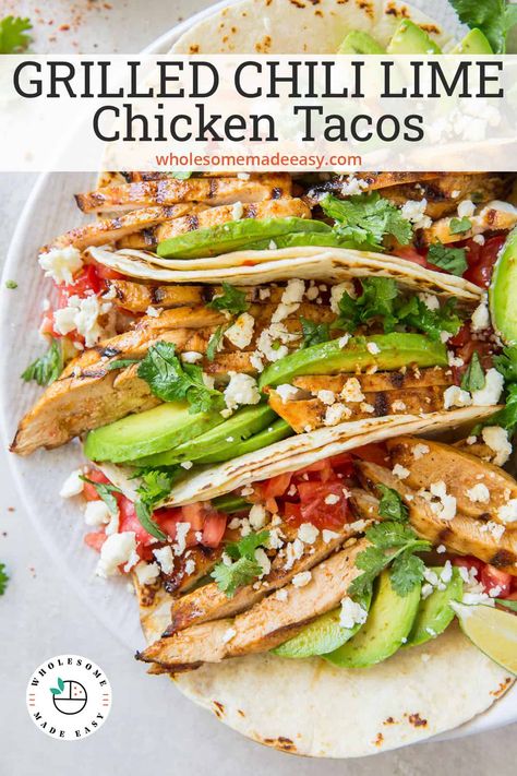 A flavorful marinade lightly sweetened with honey creates these tender grilled Chili Lime Chicken Tacos. Add the toppings of your choice for a lightened up Mexican-inspired meal. #tacos #chicken #grilledchicken #chickentacos #mexicanfood #BBQ #grilling #lowcalorie #healthyrecipes Taco Chilli, Chili Lime Chicken Tacos, Chile Lime Chicken, Tacos Chicken, Lime Chicken Tacos, Grilled Chicken Tacos, Chili Lime Chicken, Honey Lime Chicken, Hearty Chicken