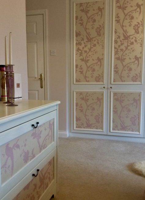 Wardrobe doors and chest of drawers given a glamorous feminine look with Laura Ashley's Oriental Garden wallpaper in chalk pink. Doors With Wallpaper, Revamp Wardrobe Doors, Wallpaper On Wardrobe Doors, Wallpaper Wardrobe, Wallpaper Wardrobe Doors, Wallpaper Cabinets, Ashley Bedroom, Revamp Wardrobe, Affordable Wall Decor