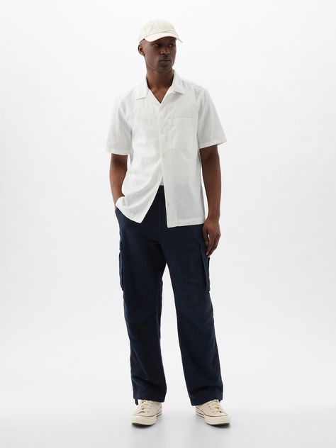 Soft linen-cotton blend cargo pants.  Button closure at E-waist.  Zip fly.  Front slant pockets, back flap pockets.  Cargo pockets at sides.  Cinch ties at hem.  * Fit: Loose.  A baggy silhouette throughout.  Note: Shay Latukolan is wearing a Gap Men Loose Pants Outfit, Loose Fit Outfit Men, Loose Pants Outfit Men, Cargo Denim Pants Outfit, Navy Cargo Pants Outfit, Loose Fit Pants Men, Navy Linen Pants Outfit, Cargo Pants Men Outfit, Blue Cargo Pants Outfit