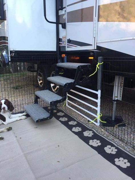 Rv fence under stairs Rv Fence For Dogs, Dog Area In Camper, Rv With Dogs, Camping Dog Fence, Dog Fence Diy, Rv Steps Ideas, Rv Dog Fence, Rv Camping With Dogs, Rv Stairs