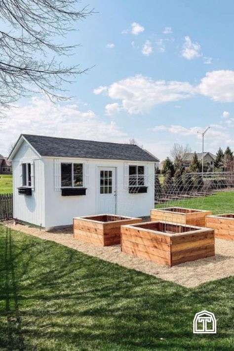 Raised Garden Beds Next To Shed, Garden Beside Shed, Garden Next To Shed, Garden Shed With Overhang, Two Sheds Connected By Deck, Multiple Sheds In Backyard, Shed Placement In Backyard, Garden Around Shed, Landscape Around Shed