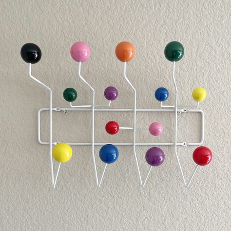 PRICES MAY VARY. Glossy solid wood balls with powder coated steel wire 14 hooks, overall dimension 19 in. L x 15 in. W x 5 in.D Hand made, Color arrangement of the balls might not be the same as pictured No assembly needed Practical and modern design for any interiors: entry way, living room, dining room, children's room, office etc. Minimalist Collection Display, Primary Colors Home Decor, Home Decor Trinkets, Mid Century Coat Rack, Quirky Room Decor Retro Vintage, Funky Wall Hooks, Mid Century Modern Bedroom Colorful, Playful Home Decor, Kidcore Decor