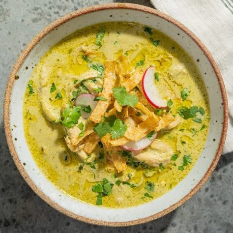 Creamy Chicken Poblano Soup Recipe - Magnolia Creamy Chicken Poblano Soup, Creamy Chicken Poblano, Chicken Poblano Soup, Chicken Poblano, Magnolia Table Recipes, Poblano Chicken, Poblano Soup, Joanna Gaines Recipes, Magnolia Kitchen