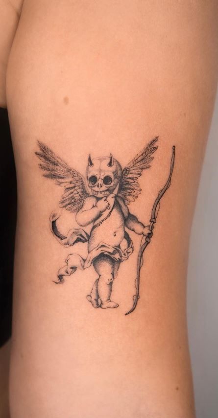 Cherub Collar Bone Tattoo, Cherub See No Evil Tattoo, Mens Cherub Tattoo, Cherub Skull Tattoo, Cherub Tattoo Placement, Demonic Angel Tattoo, Garden Angel Tattoo, Demon Cherub Tattoo, Cherub Rib Tattoo