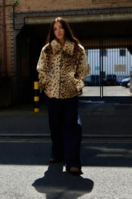 Make a leopard print statement in our new favourite coat by Silence + Noise. The fluffy faux fur coat features a spread collar, drop shoulders, long sleeves, a zip-through fastening and side pockets, all in a boxy, oversized silhouette. UO exclusive. **Content + Care** \- Fabric one: 42% Polyester, 34% Acrylic, 24% Modacrylic \- Fabric two: 100% Cotton \- Lining: 100% Polyester \- Contains 100% Recycled Polyester \- Dry clean only **Size + Fit** \- Model is 167cm/5'6" and wearing size Small \- U Fluffy Jacket Outfit, Faux Fur Coat Outfit, Product Moodboard, Leopard Print Fur Coat, Faux Fur Coats Outfit, Leopard Print Faux Fur Coat, Leopard Fur Coat, Fur Coat Outfit, Fur Lined Coat