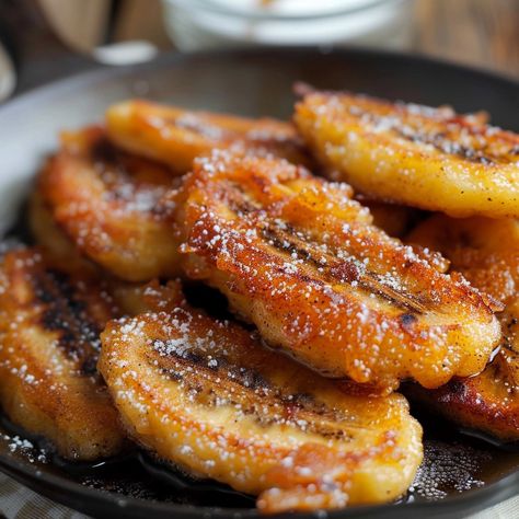 When those speckled bananas are past their prime for out-of-hand snacking, it's time to turn them into something wonderfully indulgent - skillet banana fritters! These crispy, golden fried fritters are the perfect way to use Brazilian Fried Bananas Recipe, Fried Banana Pudding, Fried Honey Bananas, Sweet Fritters, Fried Banana Recipes, Fried Fritters, Cooking Bananas, Banana Recipe, Sliced Banana