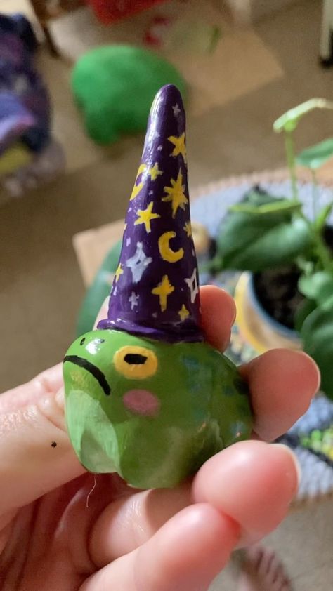 He is a frog wizard 🐸 . . . #frog #ringholder #clayart #claycreations #clayfrog #claysculpture #airdryclay #frogsculpture #frogart #art… | Instagram Cute Frog Clay Art, Wizard Frog Clay, Frog Figure Clay, Cute Things Made Of Clay, Diy Frog Crafts, Small Clay Frog, Clay Frog Ideas, Frog Clay Art, Small Clay Crafts Ideas