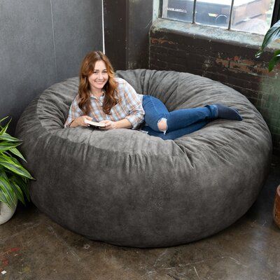 Saddle up for oversized snuggles and wrangle in a plush piece of statement furniture with the Saxx 6’ Faux Hide Bean Bag. Boasting a massive form ideal for lazy weekend family bonding or the ultimate in relaxation for one, the Saxx 6’ Faux Hide Bean Bag brings body-hugging comfort to casual living spaces. Covered in ultra-soft micro velvet with a leather-like textured appearance, the Saxx 6’ Faux Hide Bean Bag perfectly pairs Western charm with a smooth tactile experience. Fabric: Pewter Microfi Huge Bean Bag, Large Bean Bag Chair, Bean Bag Pillow, Cool Bean Bags, Large Bean Bag Chairs, Giant Bean Bag Chair, Bean Bag Bed, Bean Bag Lounger, Large Bean Bags