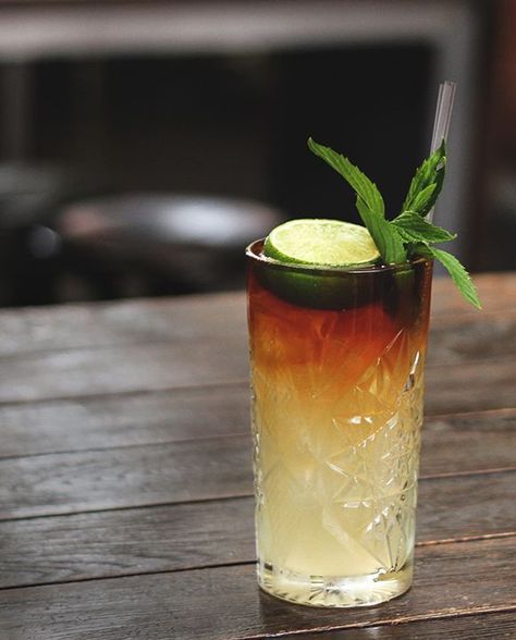 The classic Dark and Stormy is a summertime staple that matches the molasses-rich flavors of dark rum with the spice of ginger beer. Lime juice can be adjusted to taste, but at The Stables Bar in Australia, they squeeze about half a lime for best results. Dark Rum Cocktails, Resep Koktail, Beer Cocktail Recipes, Ginger Beer Cocktail, Rum Cocktail Recipes, Beer Cocktail, Dark And Stormy, Drink Bar, Rum Cocktails