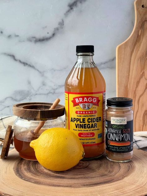 This hot apple cider vinegar detox drink is robust and comforting. Made with apple cider vinegar, lemon, honey and cinnamon for a flavorful warm tea. Skip the chill with a spicy-sweet ACV tea! #applecidervinegardrink #hotapplecidervinegartea #acvtea #acvdrink Apple Cider Vinegar Tea Sore Throat, Detox Apple Cider Vinegar Drinks, Vinegar Drinks Apple Cider, Hot Apple Cider Vinegar Drink, Pineapple And Apple Cider Vinegar Drink, Apple Cider Vinegar Lemon Honey Cinnamon, Apple Cider Vinegar Night Drink, Apple Cider Vinegar Drink With Tumeric, Apple Cider Vinegar Benefits Drinking