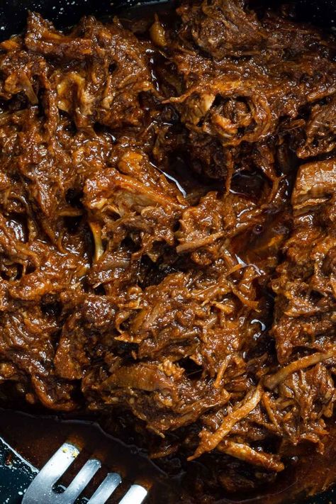 The Best Beef Barbacoa Recipe Ever (Crockpot) - RecipeMagik Easy Barbacoa Crock Pot, Cow Cheek Barbacoa, Barbacoa Sauce Recipe, Cheek Meat Barbacoa Crockpot, Spanish Beef Recipes, Barbacoa Crock Pot Mexican Authentic, Barbacoa Oven, Beef Cheek Meat Recipe, Crockpot Barbacoa Beef