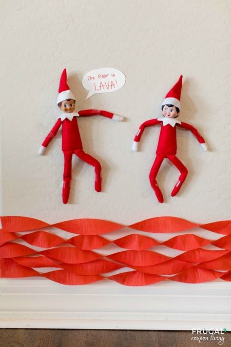 Silly Elf on the Shelf Floor is Lava Game Idea + How to Play The Floor is Lava. This quick and easy Elf idea took 5 minutes using tape and red crepe paper streamers. Over 500 new Elf on a Shelf ideas daily plus free Elf on the Shelf printables for your Scout Elf doll. #FrugalCouponLiving #ElfontheShelf #ElfontheShelfIdeas #ElfIdeas #funnyelfideas #funnyelfontheshelf #elfprintables #freeelfprintables #printables #freeprintables #ElfonaShelf #Floorislava #lava Floor Is Lava Game, Elf On The Shelf Kit, Elf On A Shelf Ideas, Elf Idea, Elf Printables, Funny Elf On The Shelf, Floor Is Lava, Easy Elf, Elf Kit