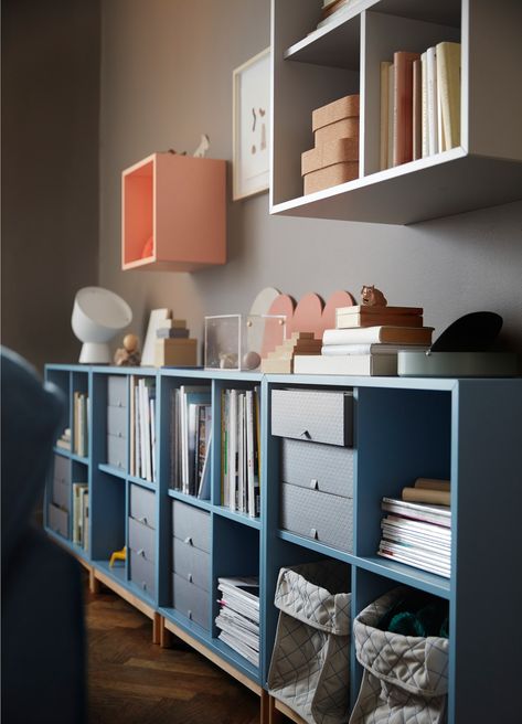 IKEA EKET blue cabinet open storage shelves and PALLRA mini chests make a great storage unit combination to organise books, toys and more. Eket Ideas, Small Living Room Storage, Bedroom Storage Unit, Ikea Inspo, Ikea Bedroom Storage, Corner Shelf Ideas, Kid Friendly Living Room, Ikea Eket, Bedroom Wall Units