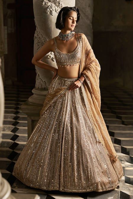 Buy Gold Net Embroidered Mirror Round Bridal Lehenga Set For Women by Seema Gujral Online at Aza Fashions. Lehenga Shoot, Tuscan Summer, Sequins Lehenga, Golden Lehenga, Sequin Lehenga, Peach Lehenga, Seema Gujral, Gold Lehenga, Mirror Work Lehenga