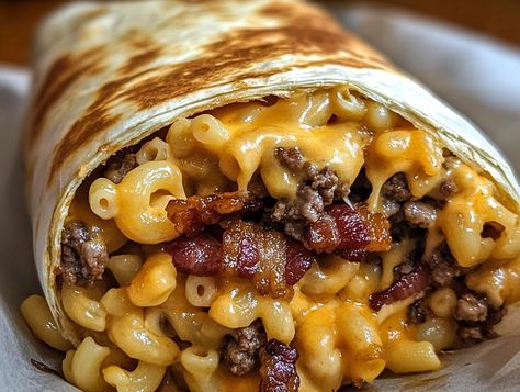 Imagine a dish that brings together the best of three comfort food classics: a juicy burger, creamy mac 'n' cheese, and crispy bacon. The Bacon Mac 'n' Bacon Mac And Cheese Burger Wrap, Mac And Cheese Burger, Burger Wrap, Hearty Snacks, Juicy Burger, Bacon Mac And Cheese, Mustard Pickles, Creamy Mac And Cheese, Cheese Burger