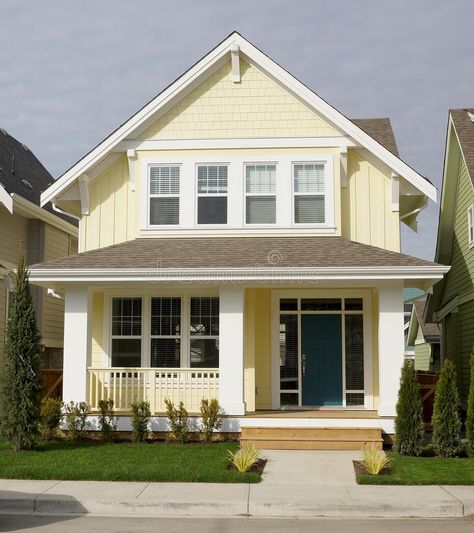 Yellow Exterior House Colors, Yellow Vinyl Siding, Siding Ideas Exterior, Yellow Beach House, House Siding Ideas, Yellow House Exterior, Exterior House Siding, Siding Ideas, White Shutters