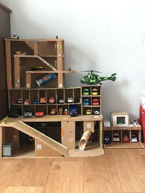 Diy Toy Garage, Hot Wheels Track Diy, Child Room Design, Diy Toys For Kids, Cardboard Box Car, Cardboard City, Toy Car Garage, Cardboard Crafts Kids, Kids Backyard Playground